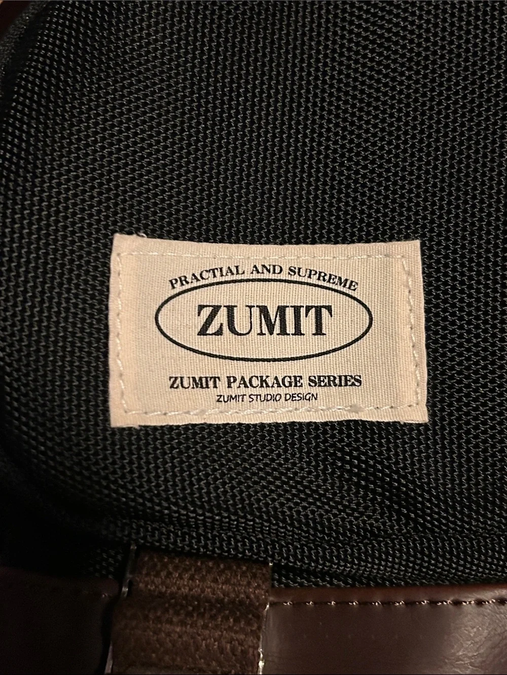 Zumit Black Backpack with Brown Trim and Leather-Look Base